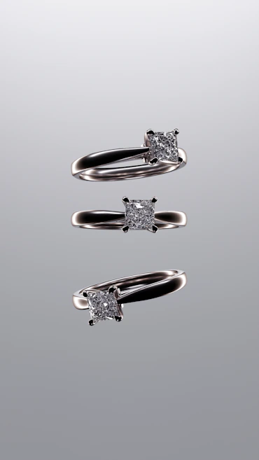 A couple of rings that are sitting on a table