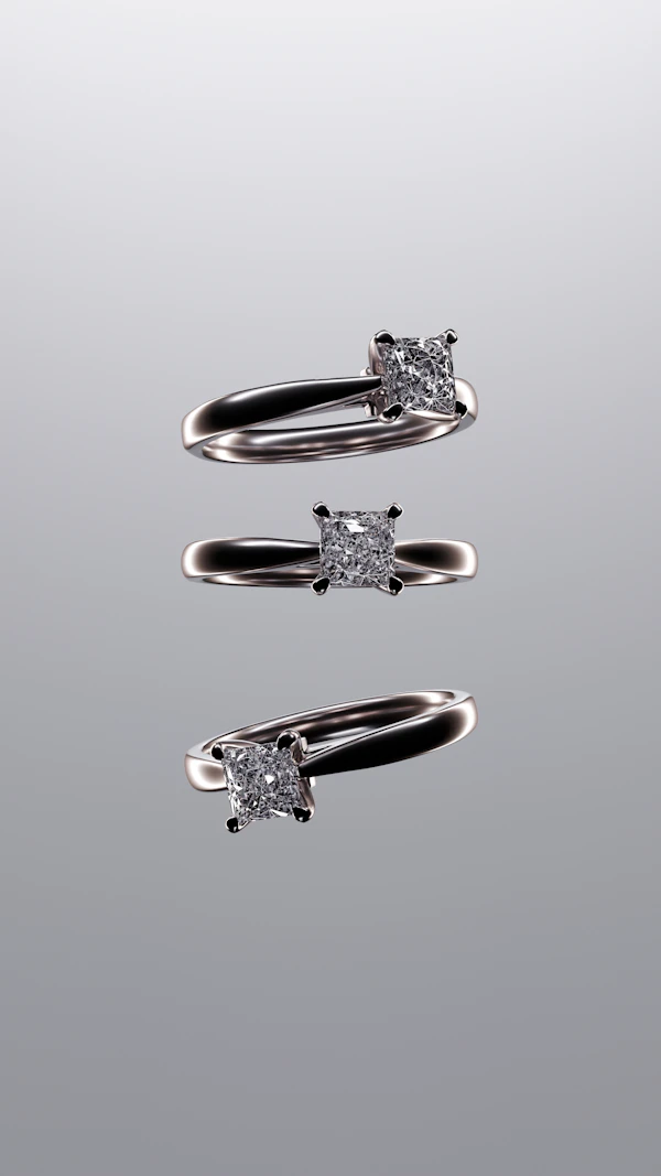 Three silver solitaire rings with square-cut stones