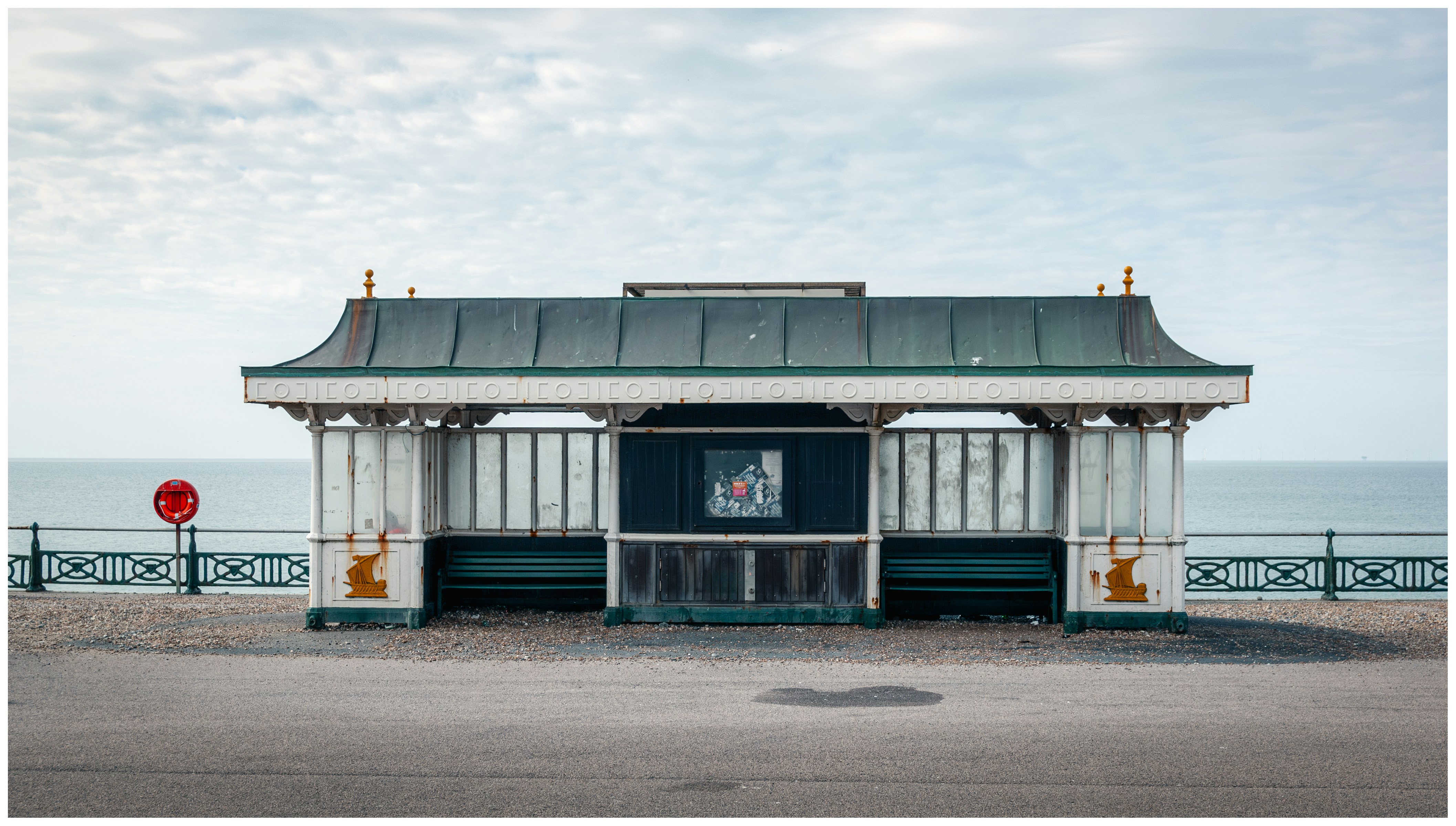 a-picture-of-a-small-building-near-the-ocean-photo-free-shelter-image