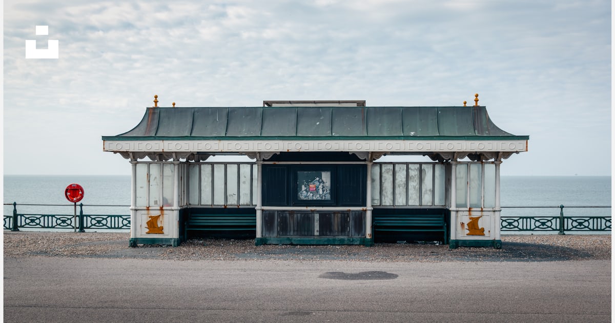 A Picture Of A Small Building Near The Ocean Photo Free Shelter Image a-picture-of-a-small-building-near-the-ocean-photo-free-shelter-image