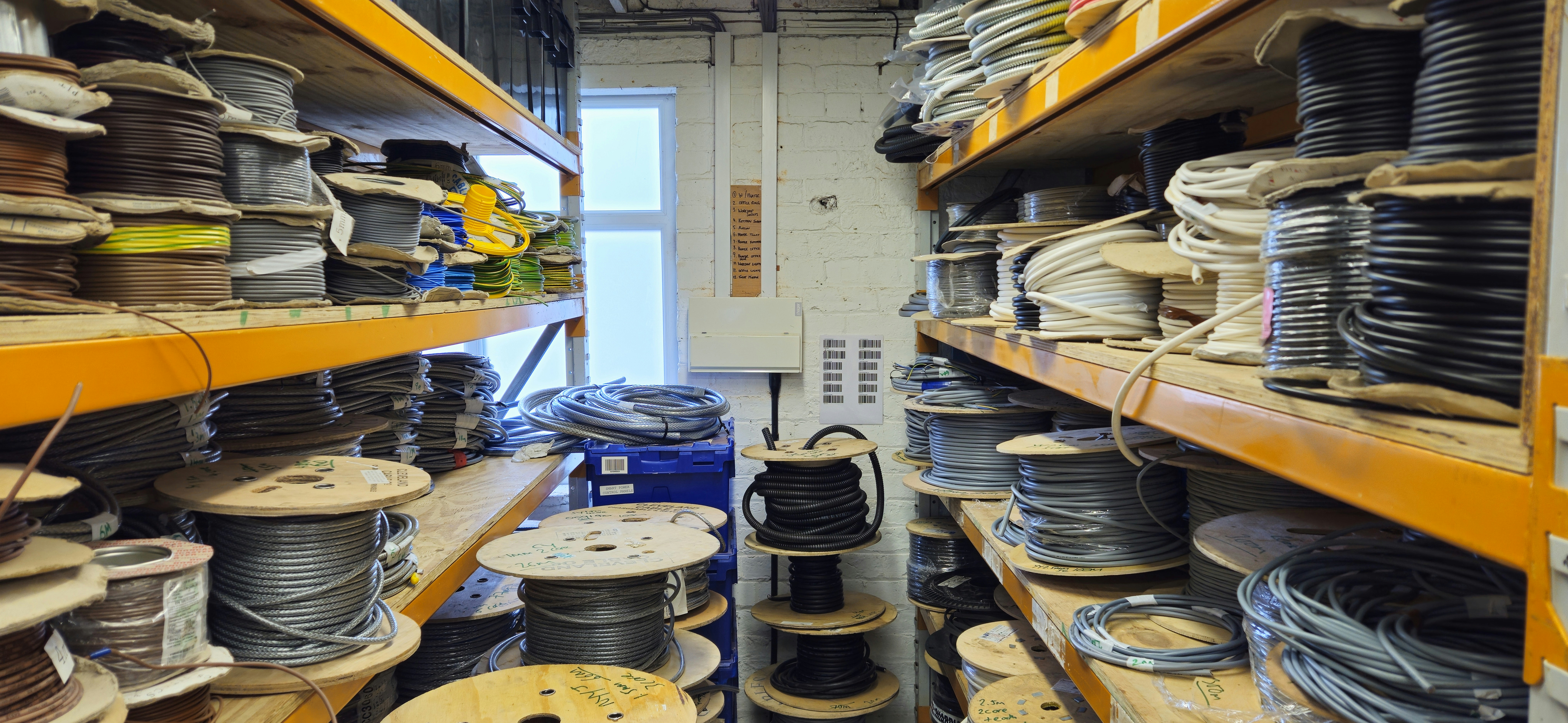 Electrical wire cable rolls in workshop setting