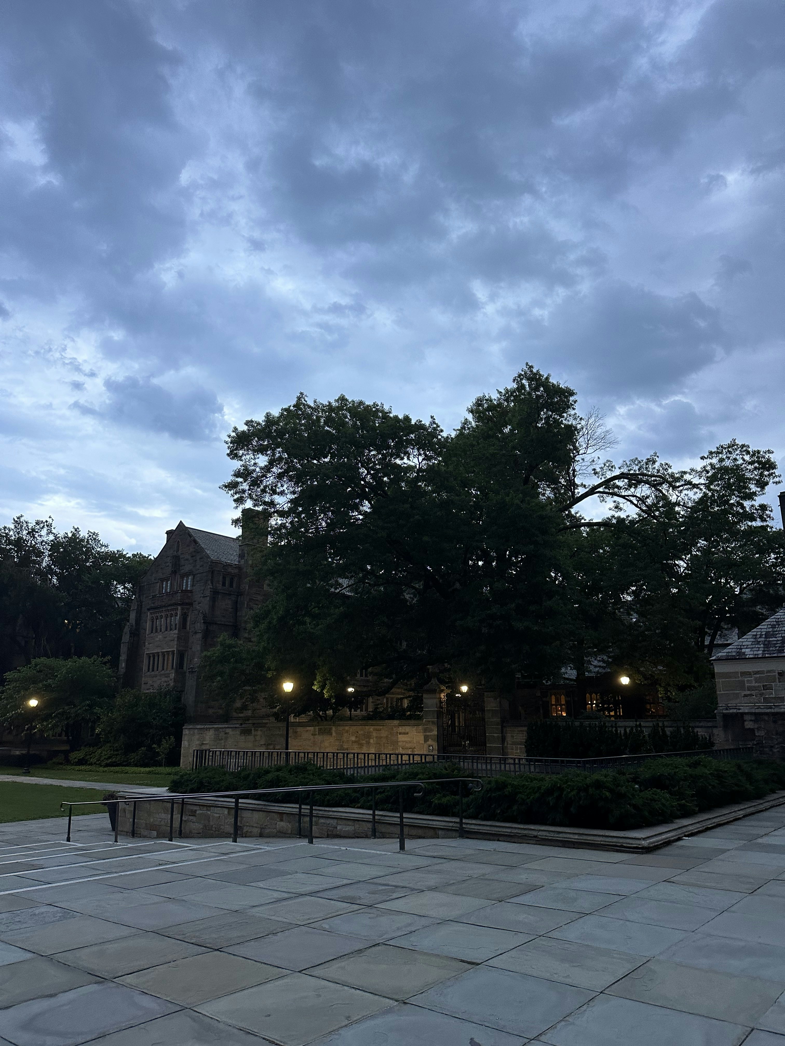 A large building with a clock tower in the middle of it