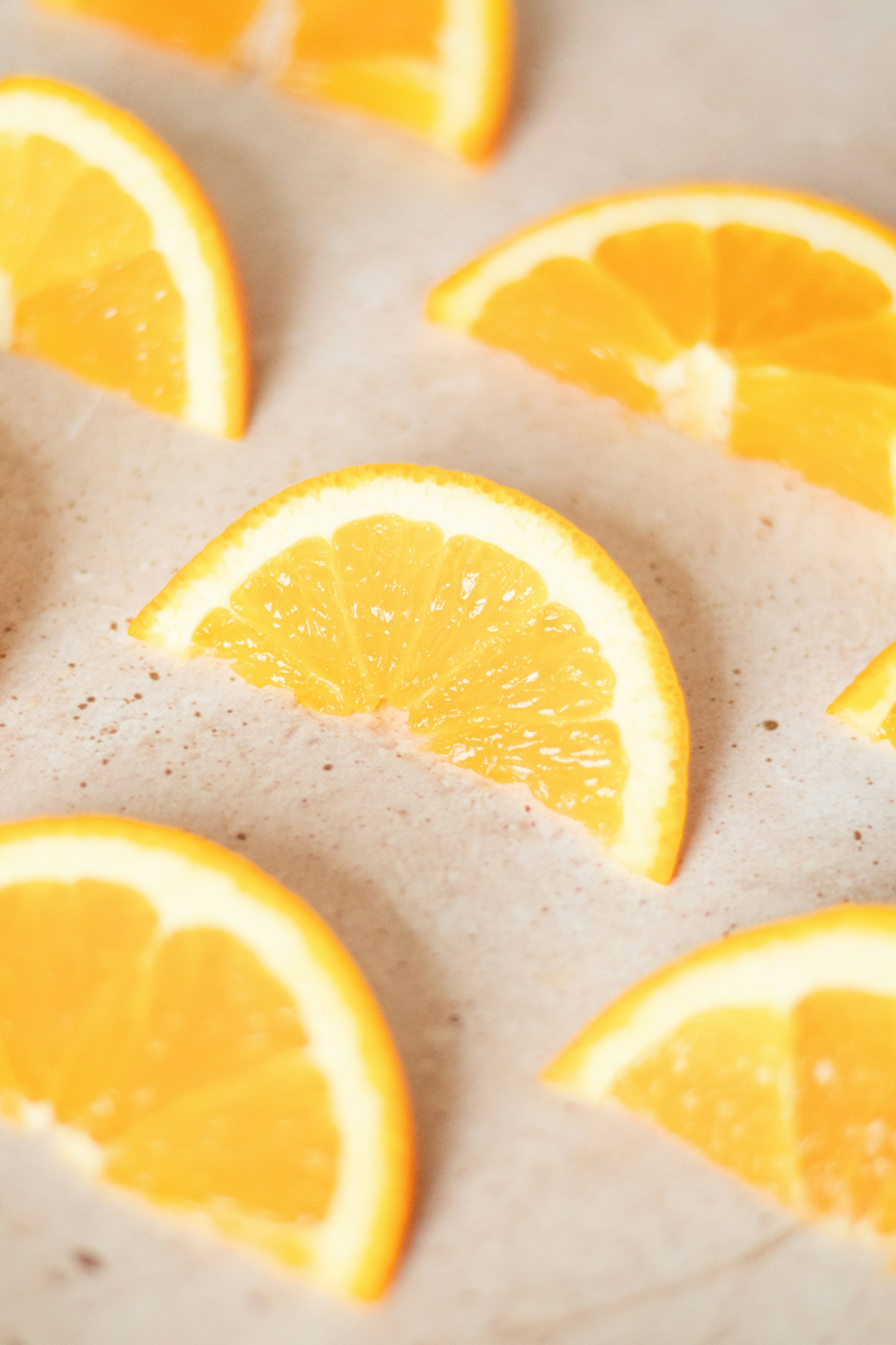 A bunch of oranges that are sitting on a table