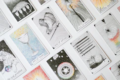 A bunch of cards that are on a table