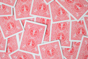 A pile of red and white playing cards
