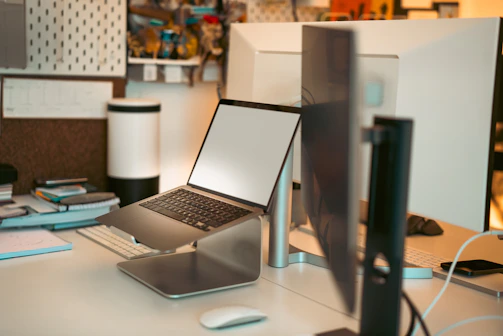A laptop computer sitting on top of a desk