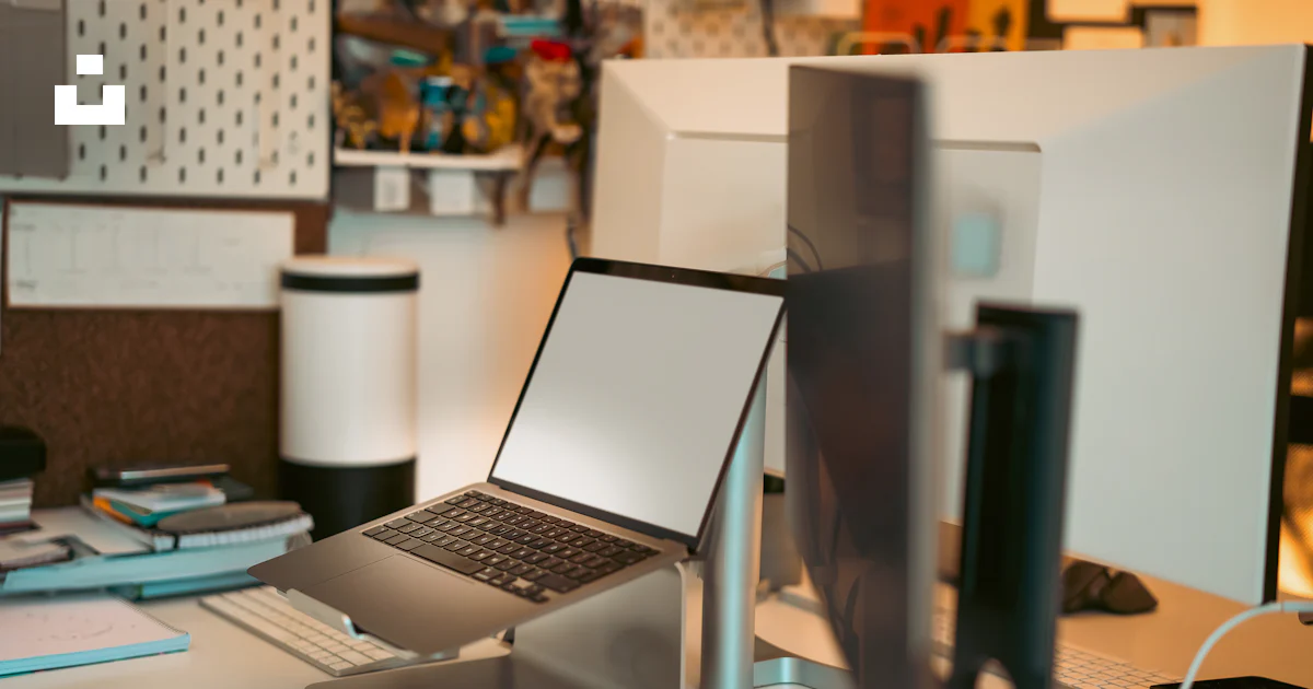 Top Bottom Computer A laptop computer sitting on top of a desk photo – Free Table Image on ...