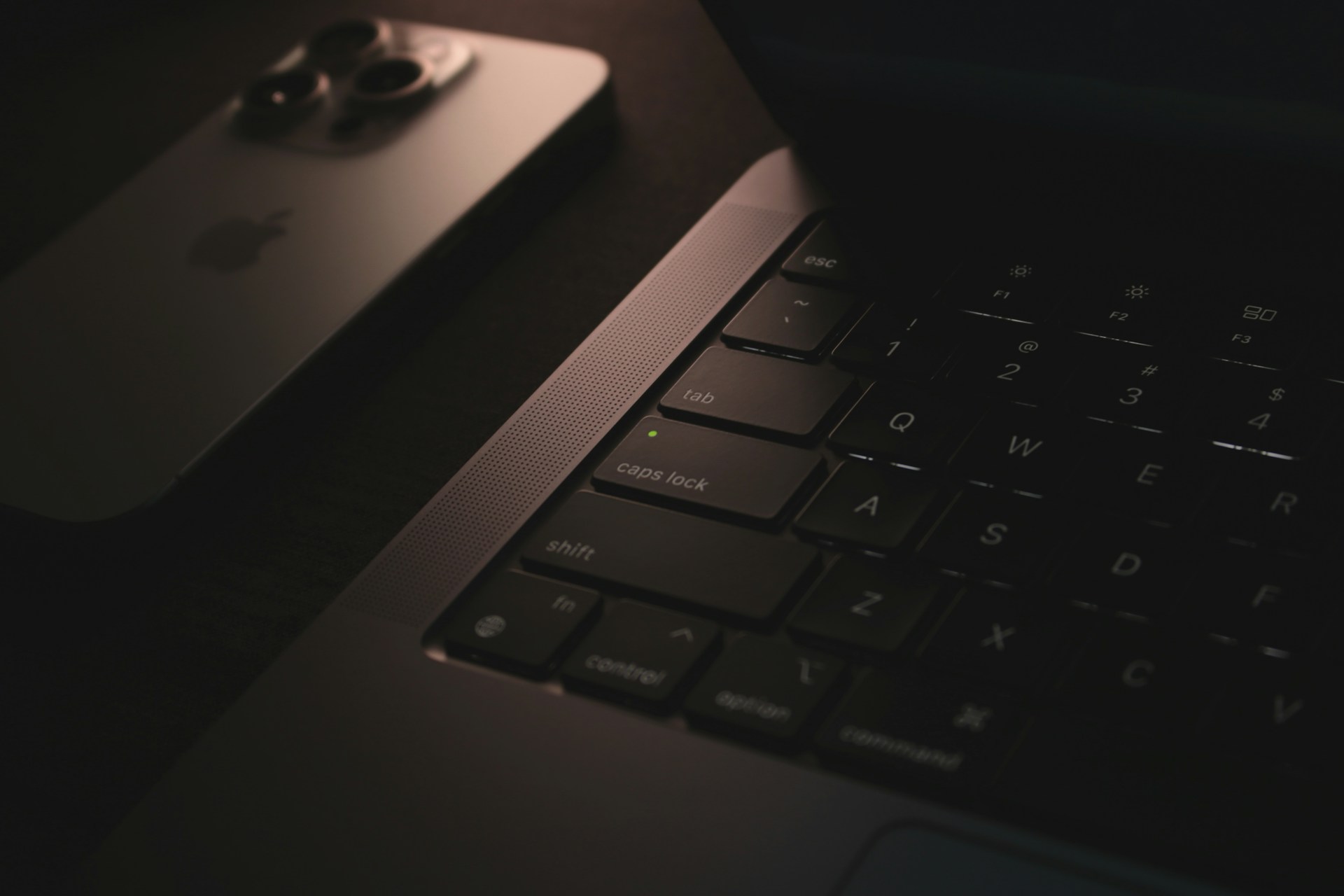 A laptop computer sitting on top of a desk