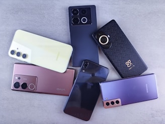 A group of cell phones sitting next to each other