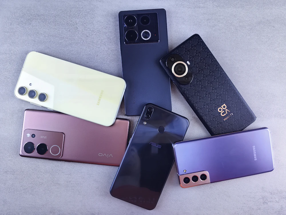 A group of smartphone models sitting next to each other