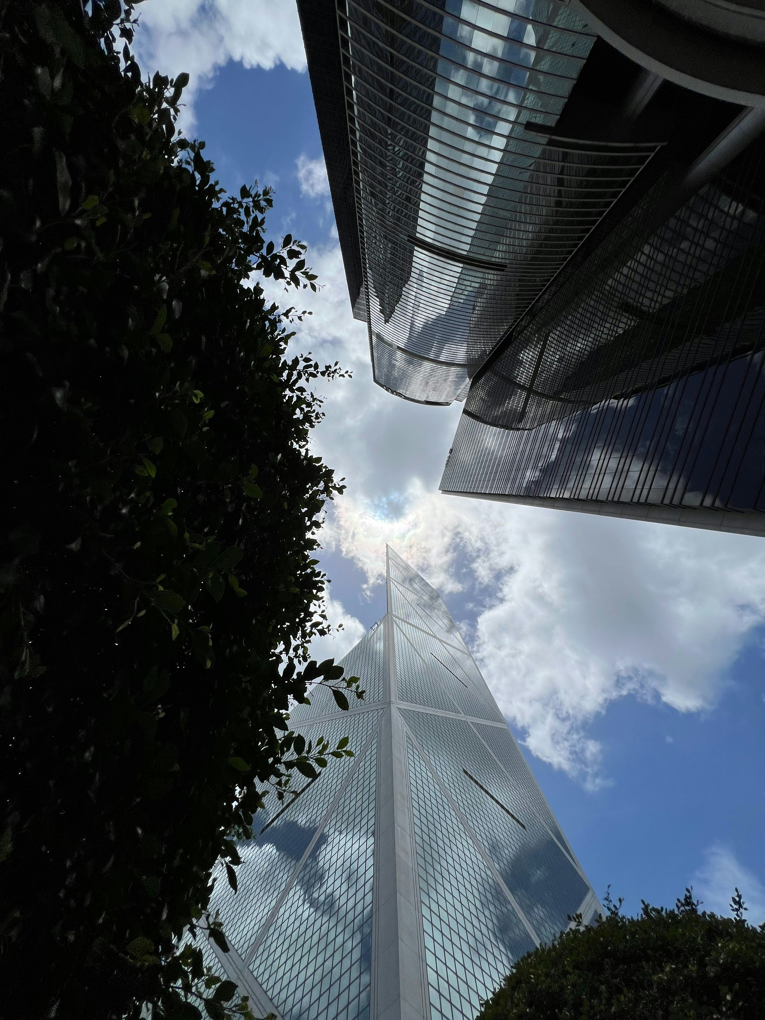A view of a very tall building from the ground