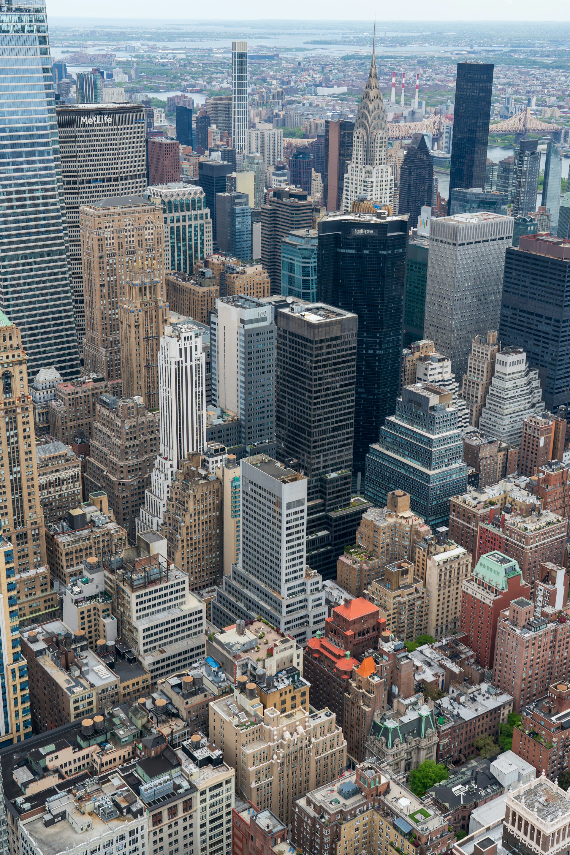 An aerial view of a city with tall buildings