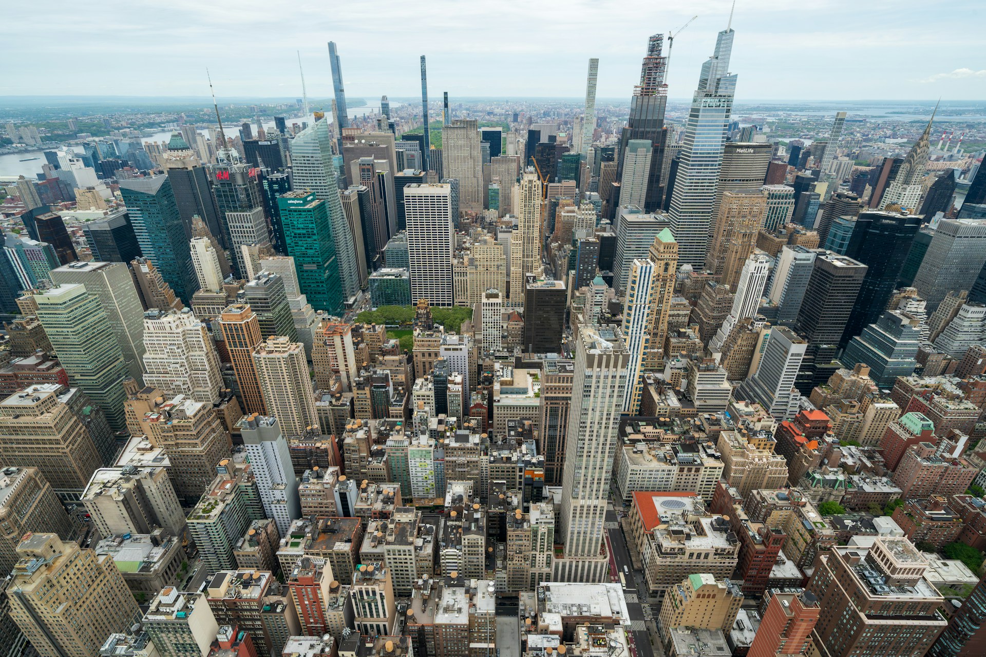 An aerial view of a city with tall buildings