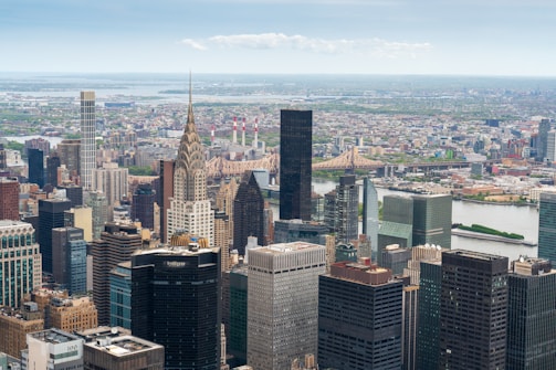 A view of a city from the top of a building