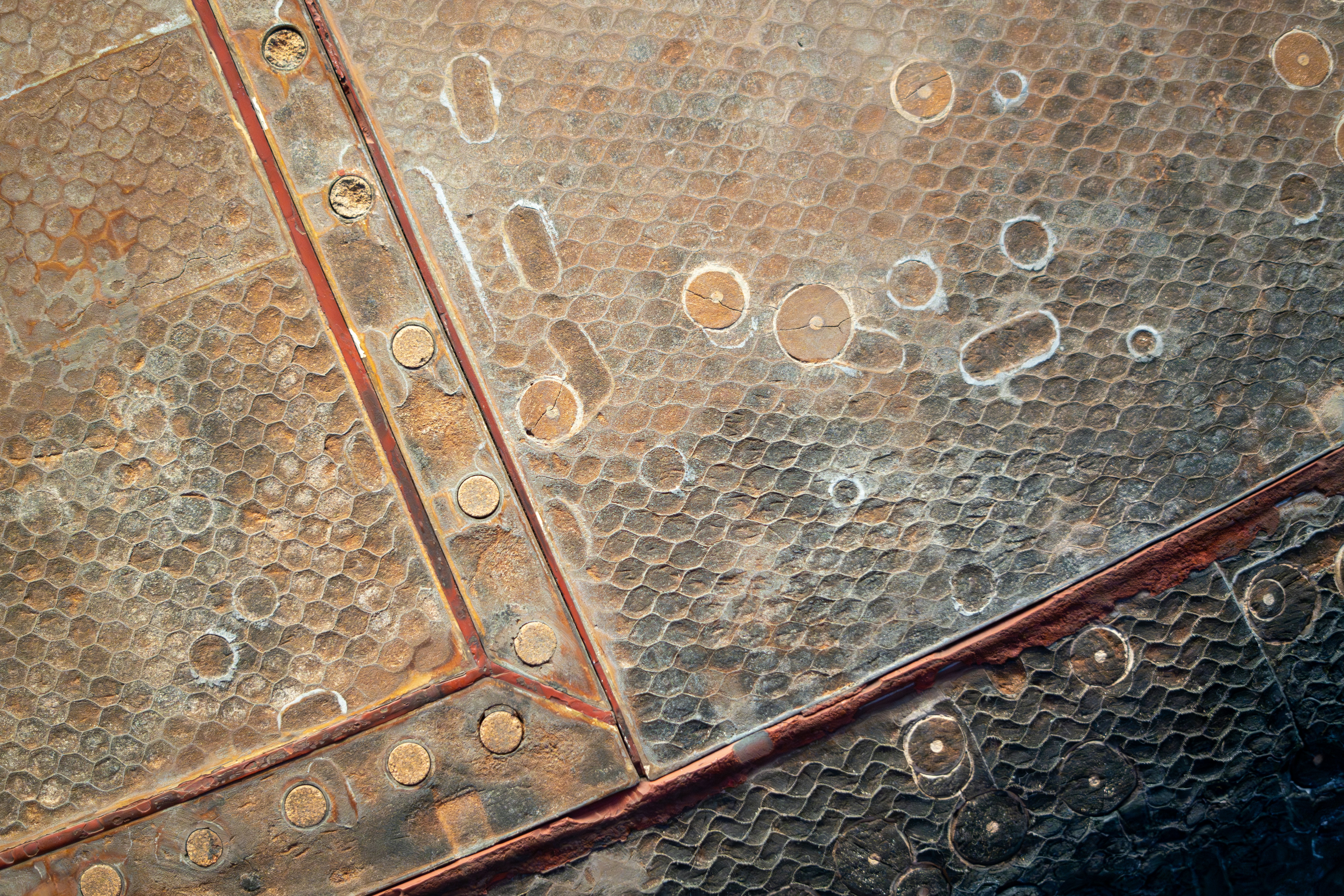 a corroded evaporator coil with visible copper pitting