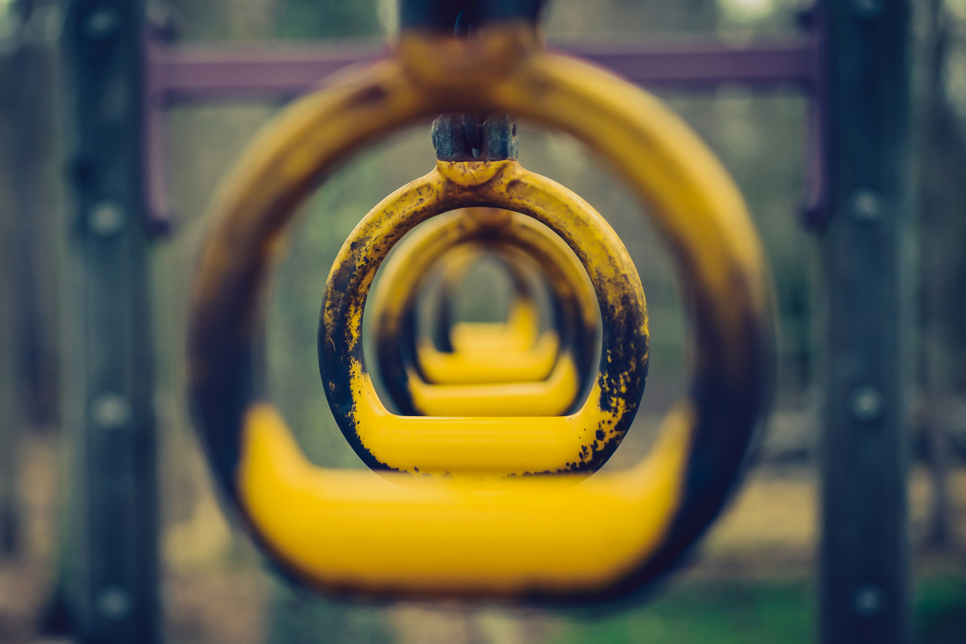 A close up of a yellow object in a park