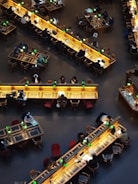A group of people sitting at tables in a restaurant
