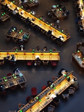 A group of people sitting at tables in a restaurant