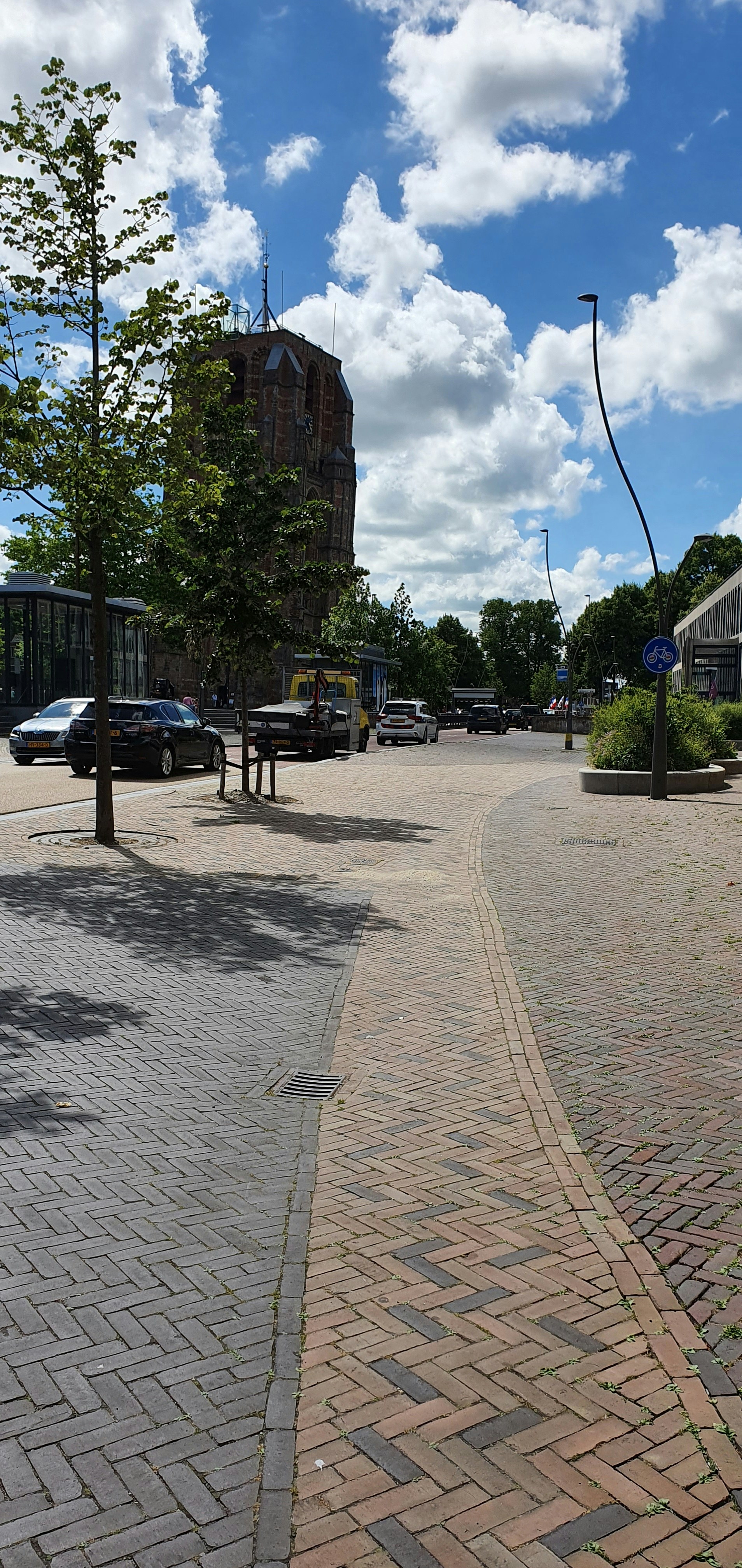 A red fire hydrant sitting on the side of a road