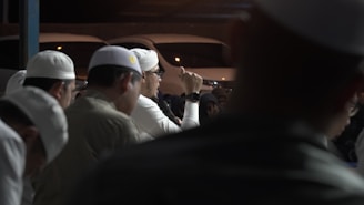 A group of men standing next to each other