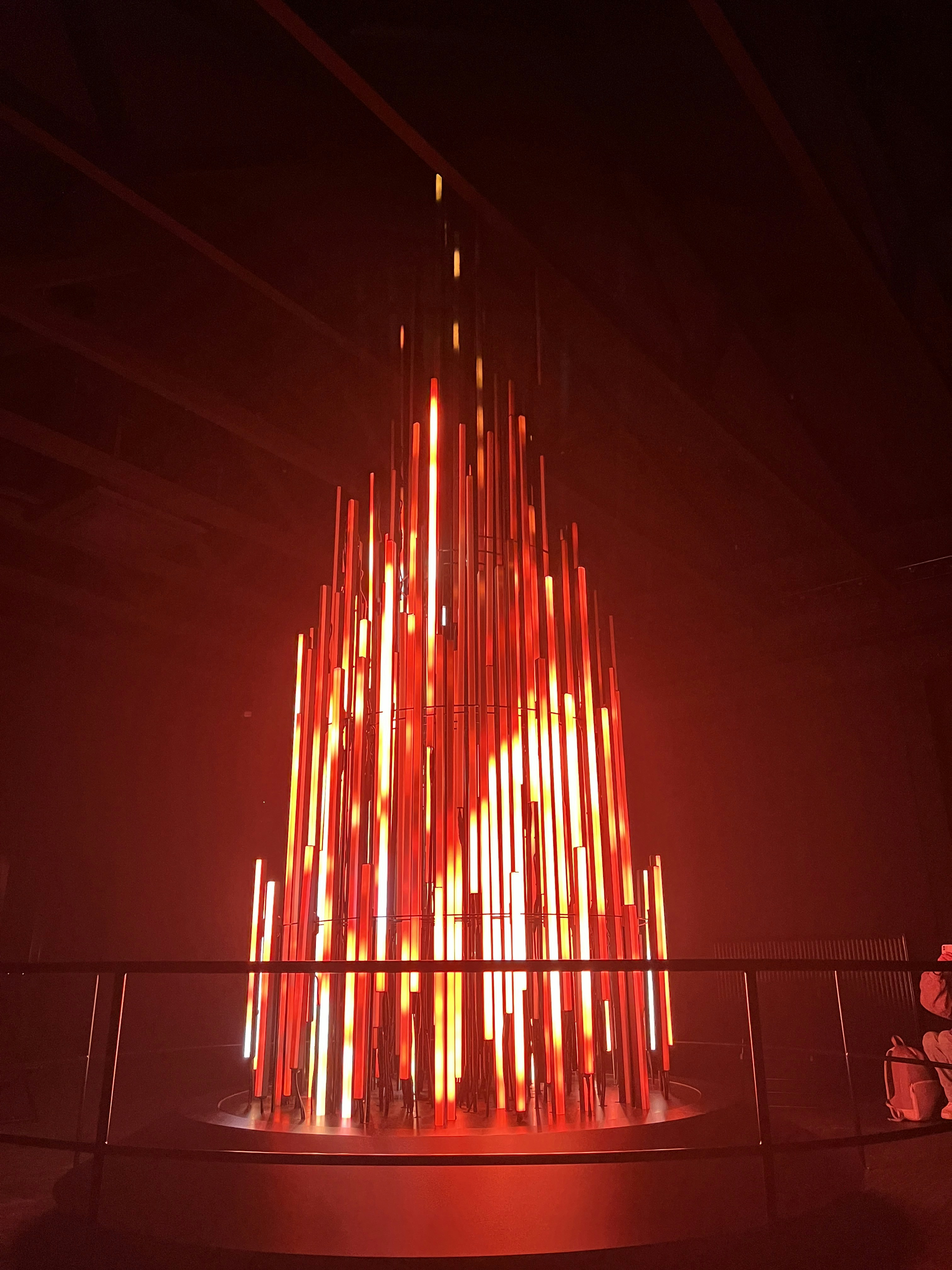 A red light is shining in the dark