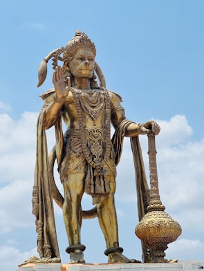 A statue of a man holding a staff