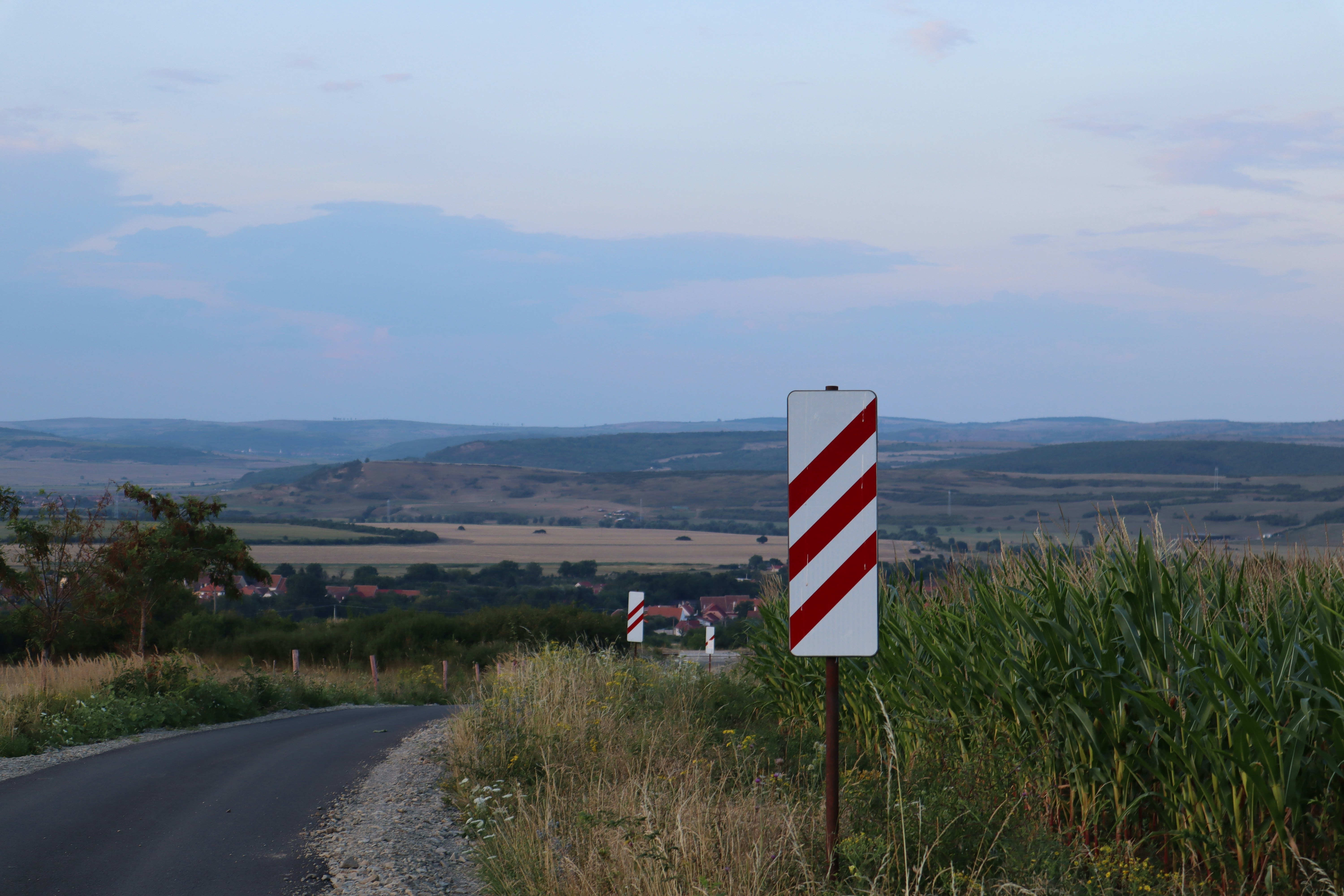 A street sign on the side of a road