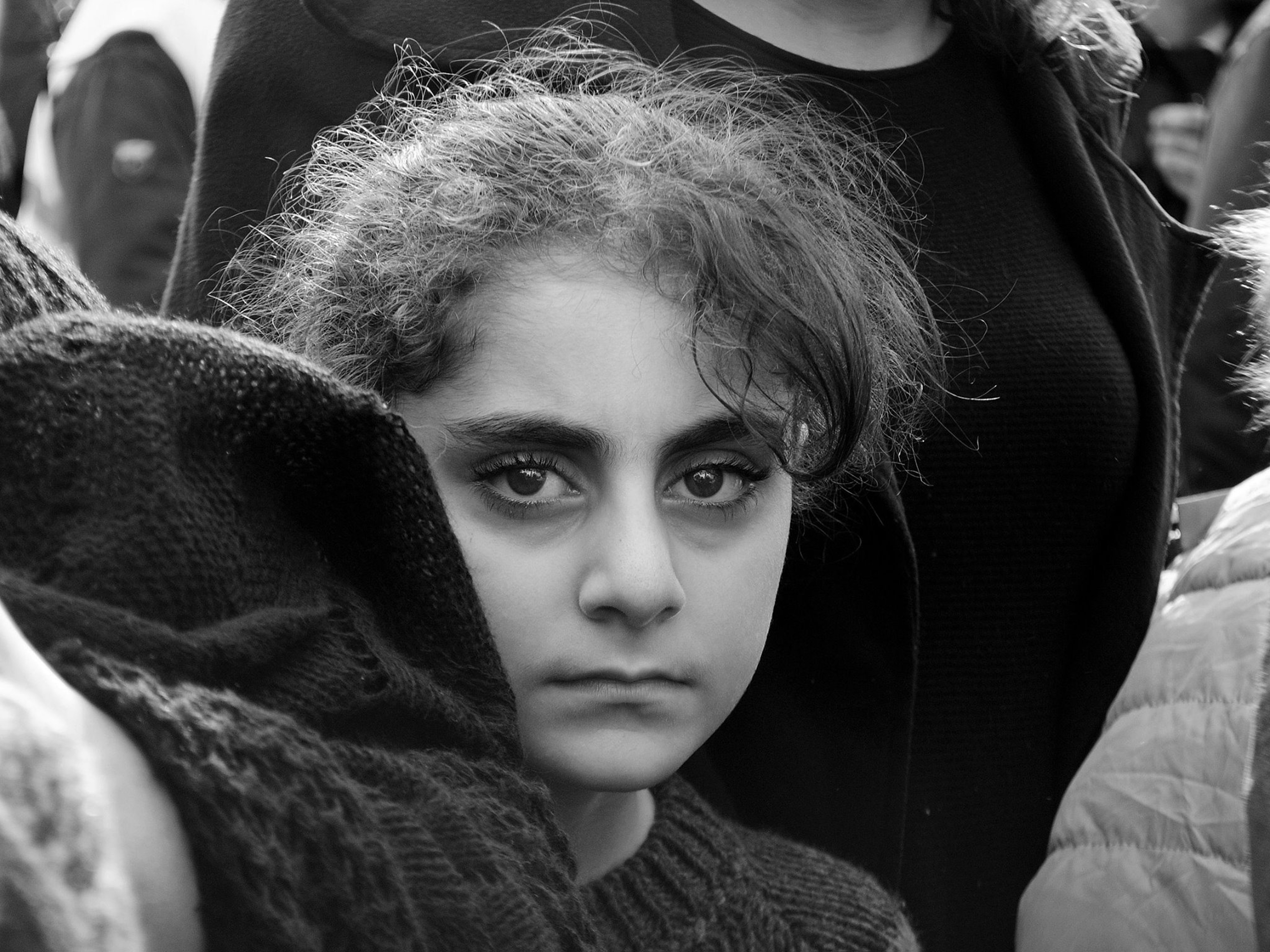 A woman with a scarf around her neck