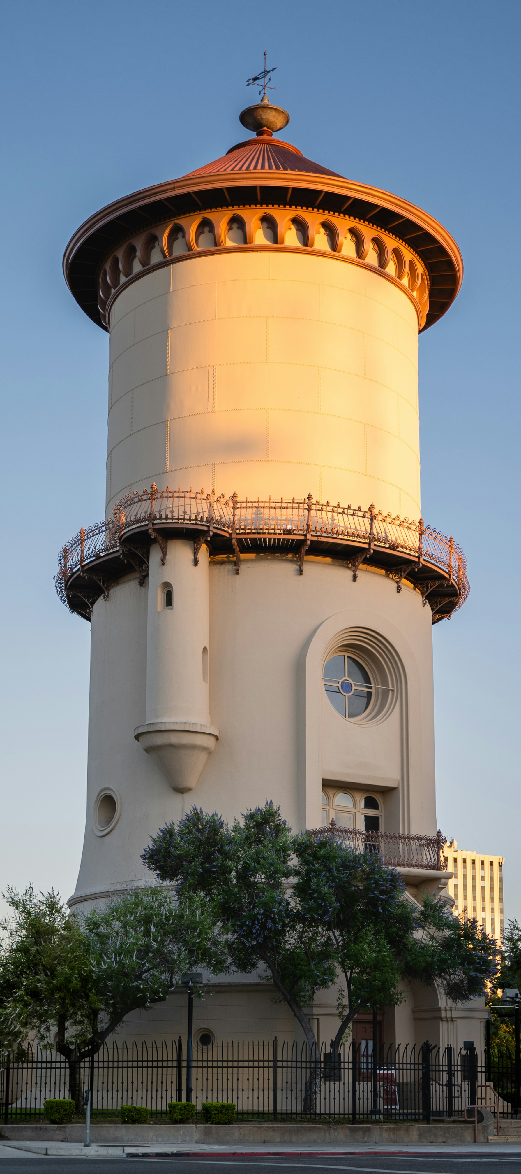 A large white tower with a clock on top of it