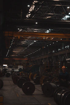 A large warehouse filled with lots of steel