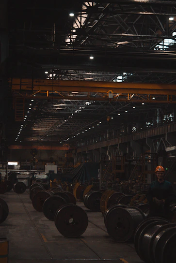 A large warehouse filled with lots of steel