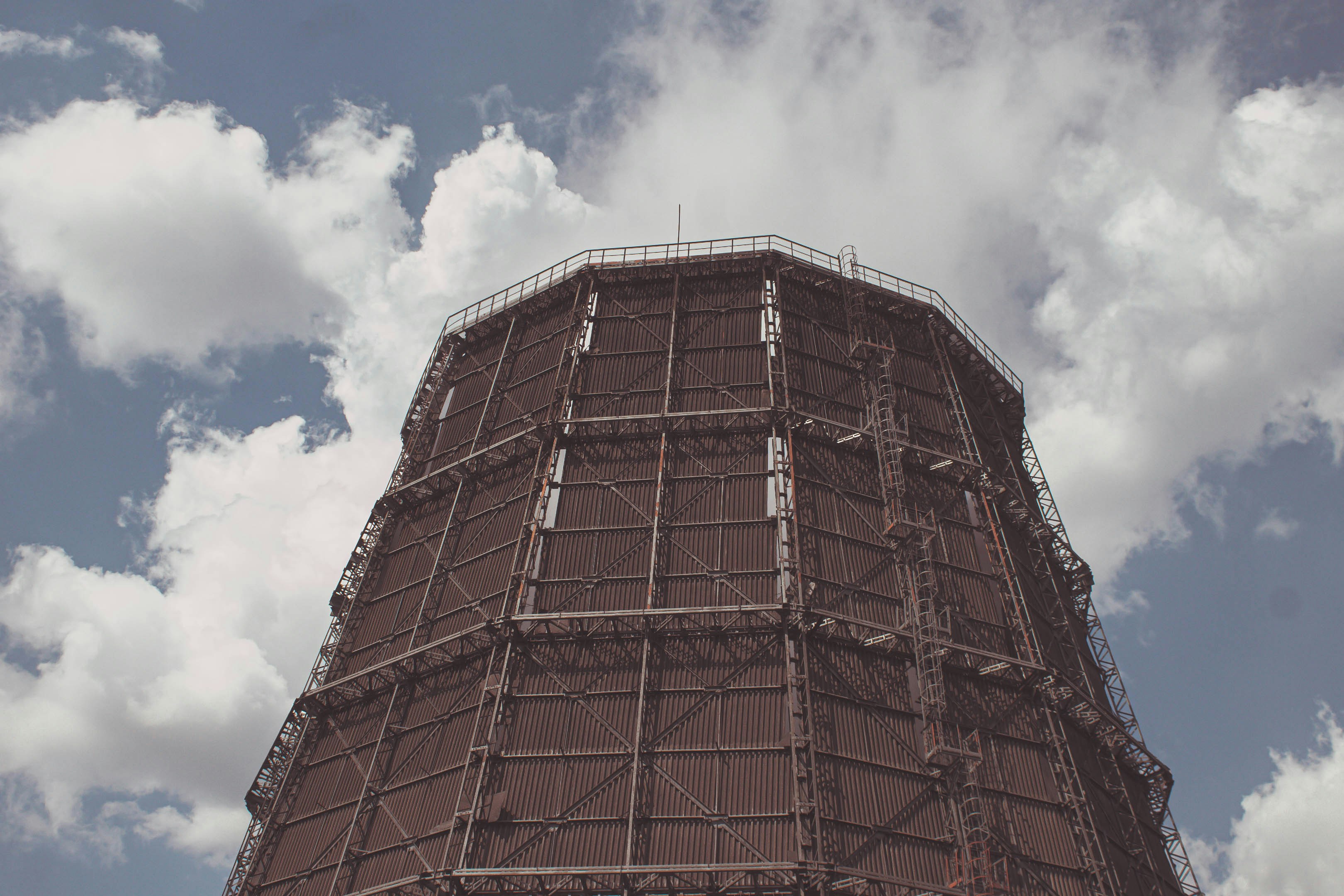 A tall tower with a clock on the top of it