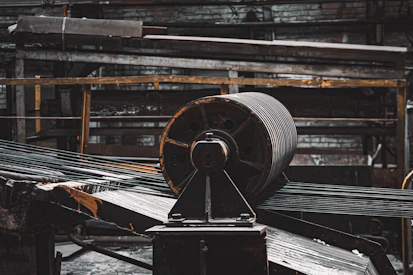 A machine is moving a large piece of metal
