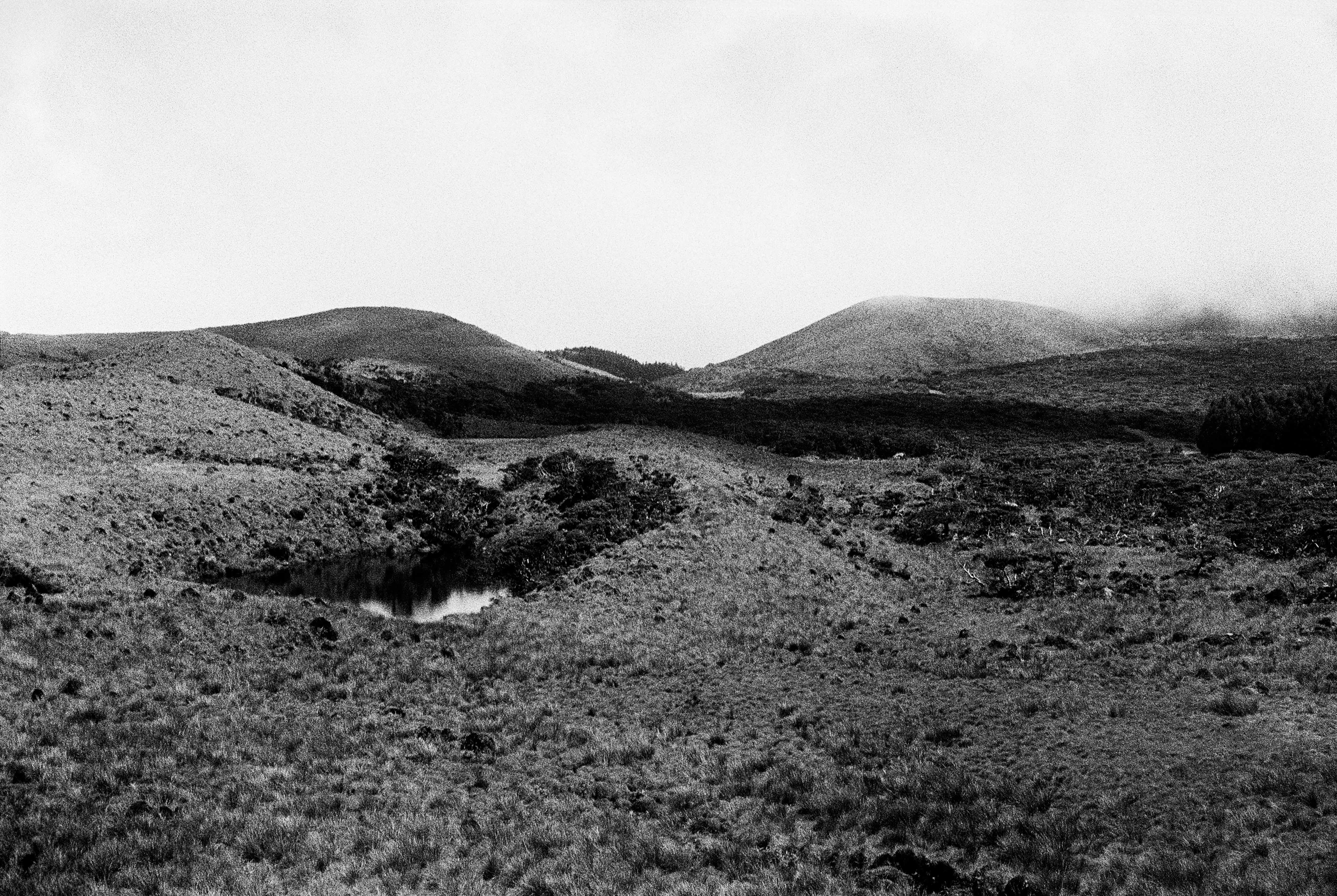 A black and white photo of a mountain range