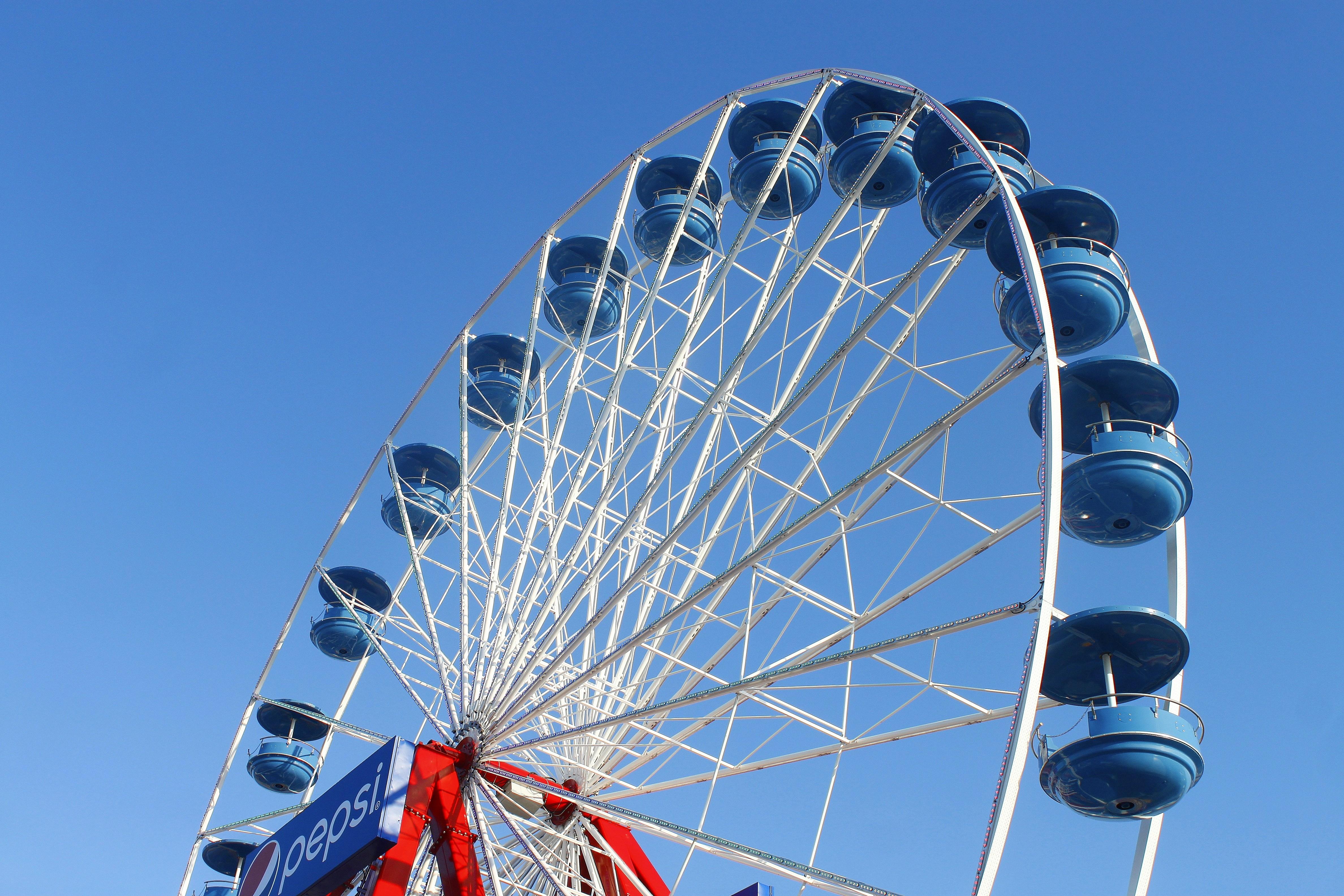 A large ferris wheel on a clear day