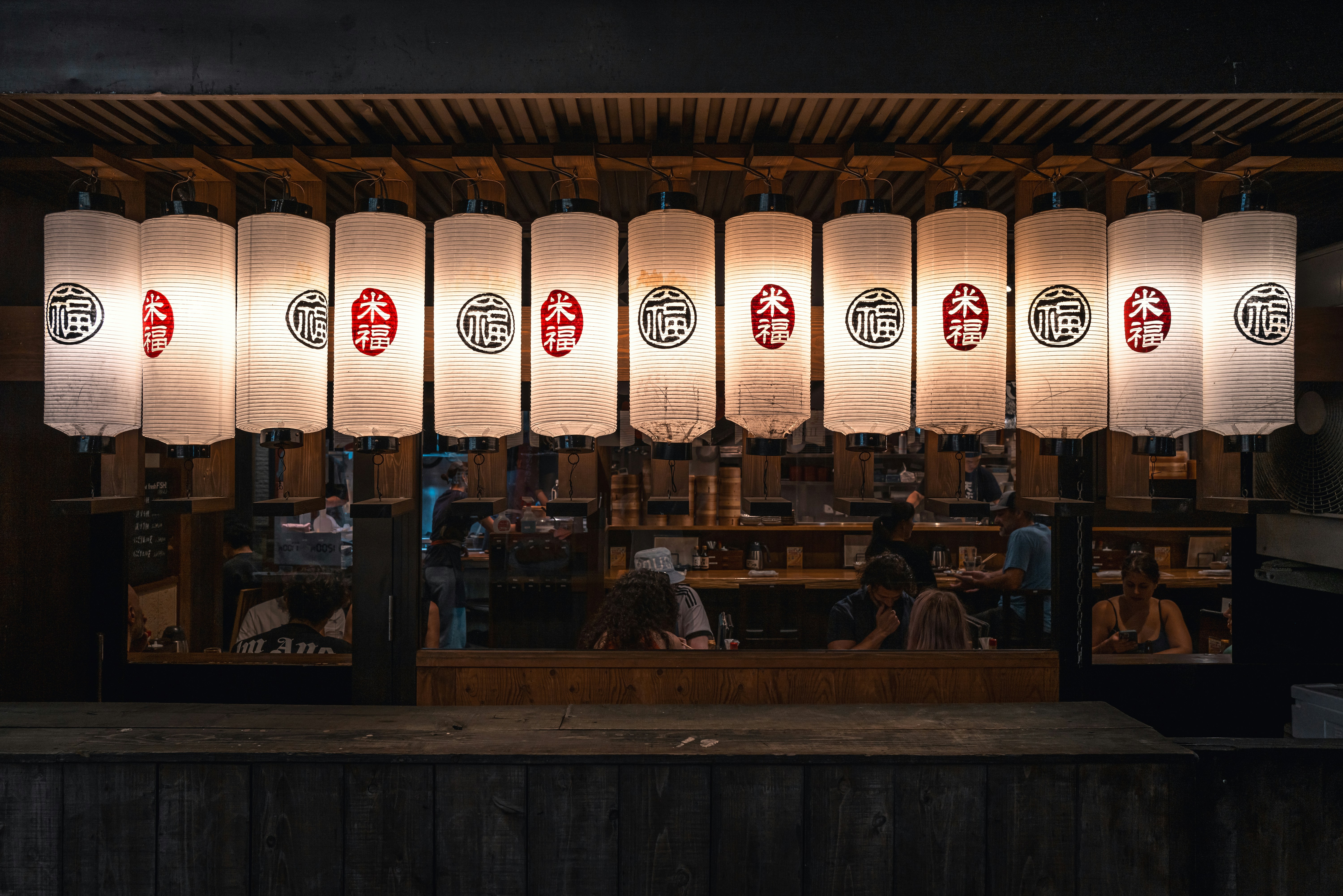 A group of lights hanging from the side of a wall