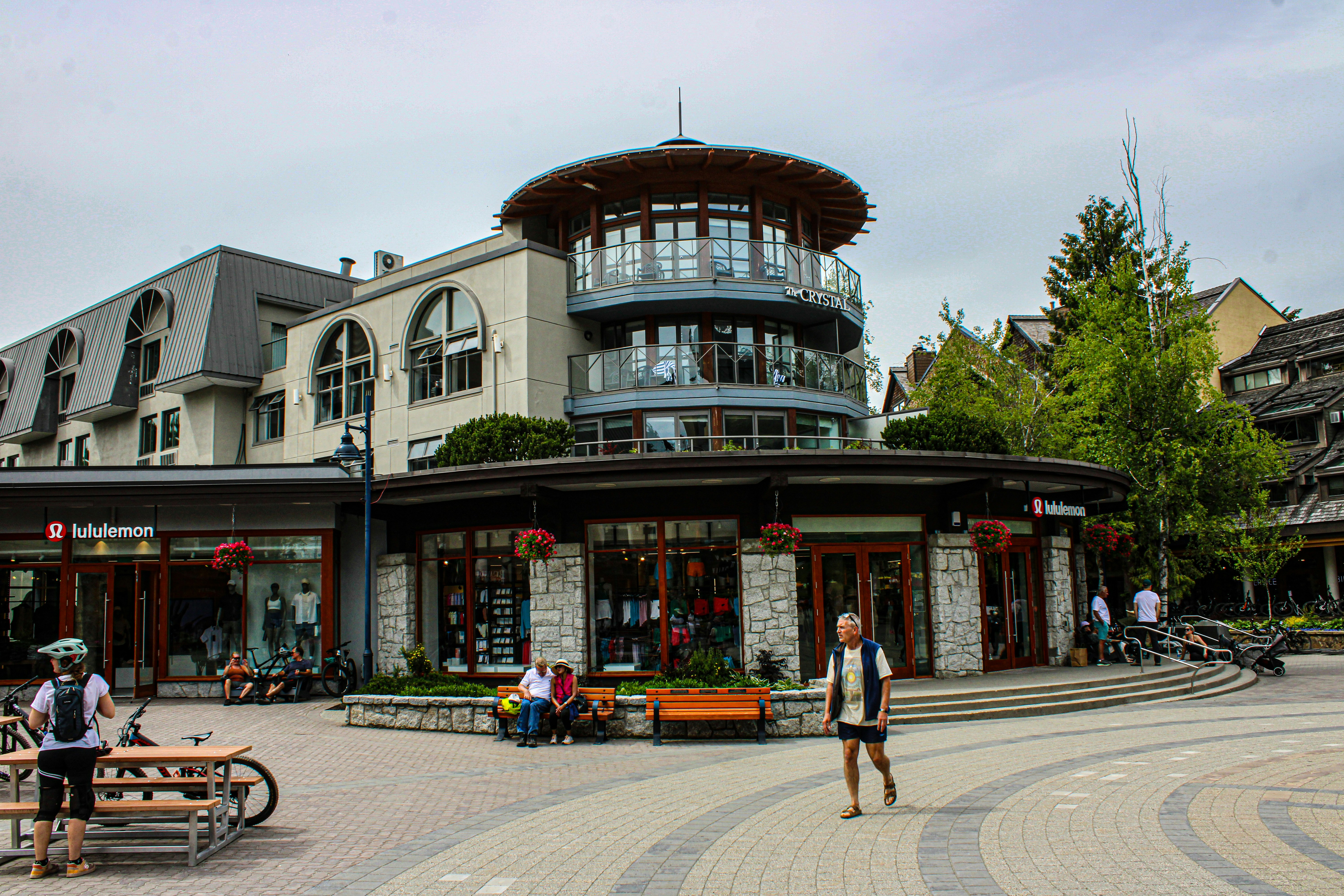 A group of people standing around a building