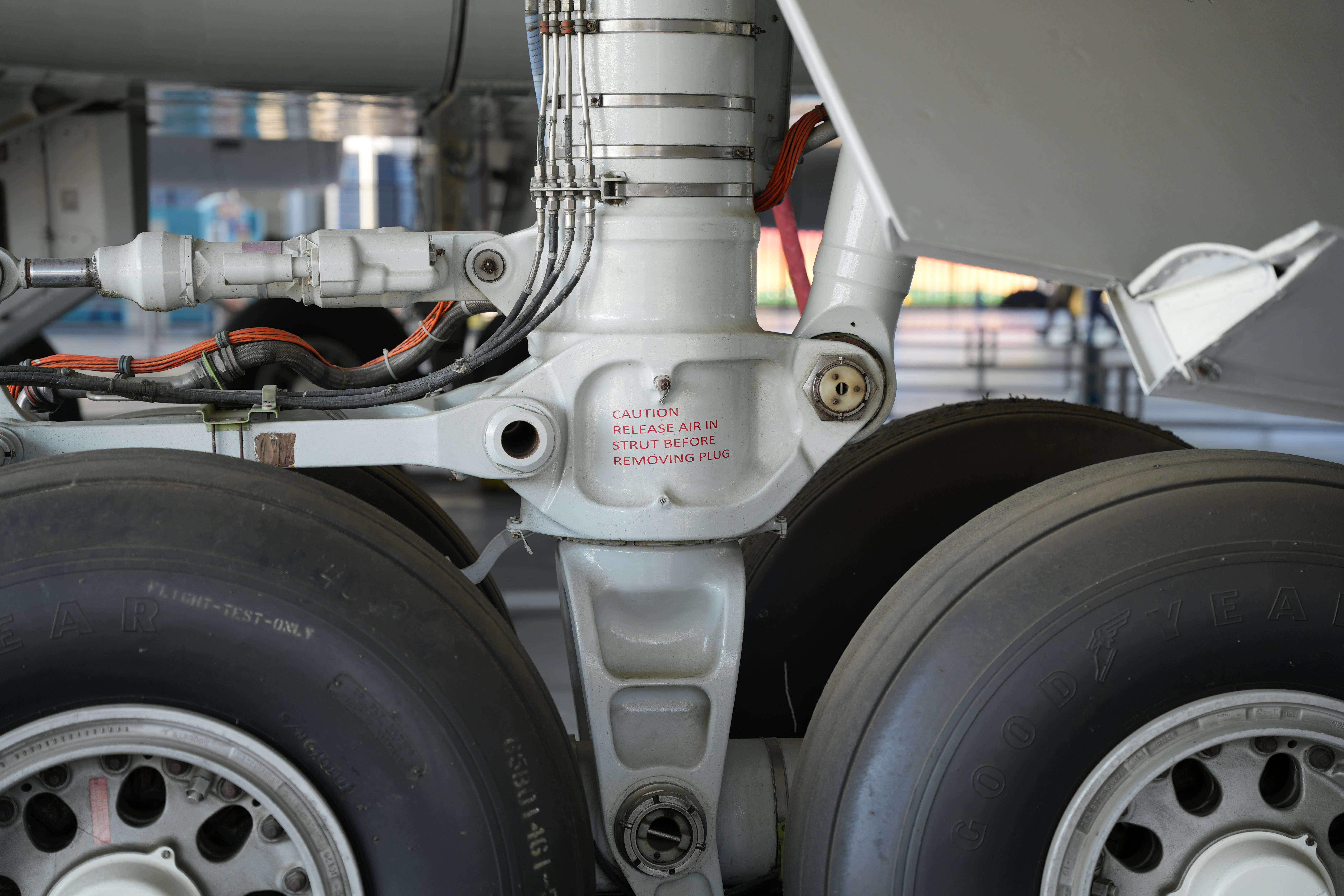 A close up of the front wheels of a vehicle, 