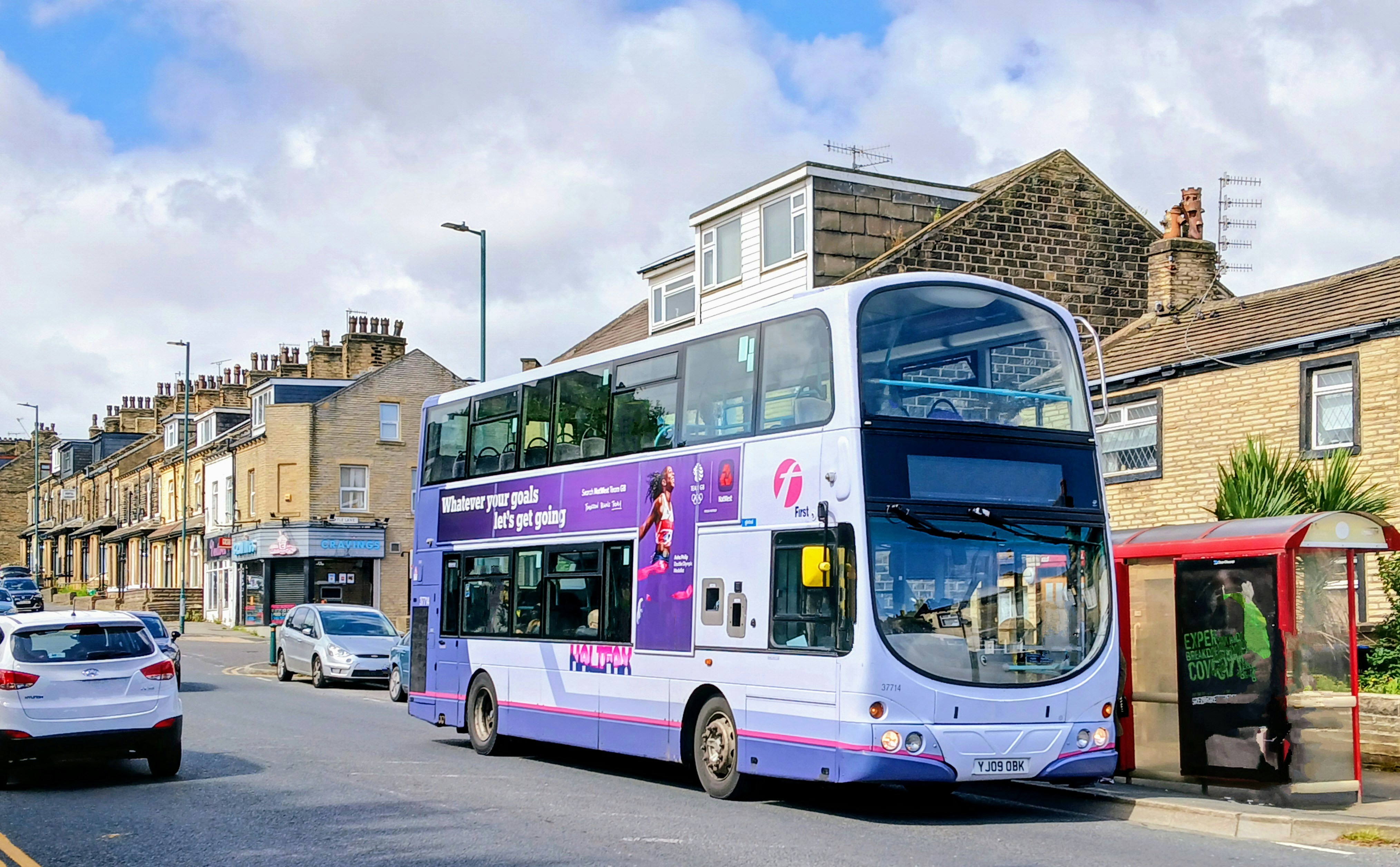 A double decker bus on a city street