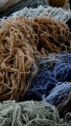 A close up of a pile of yarn