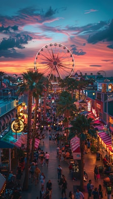 A crowded street with a ferris wheel in the background