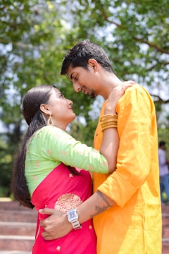 A man and a woman standing next to each other