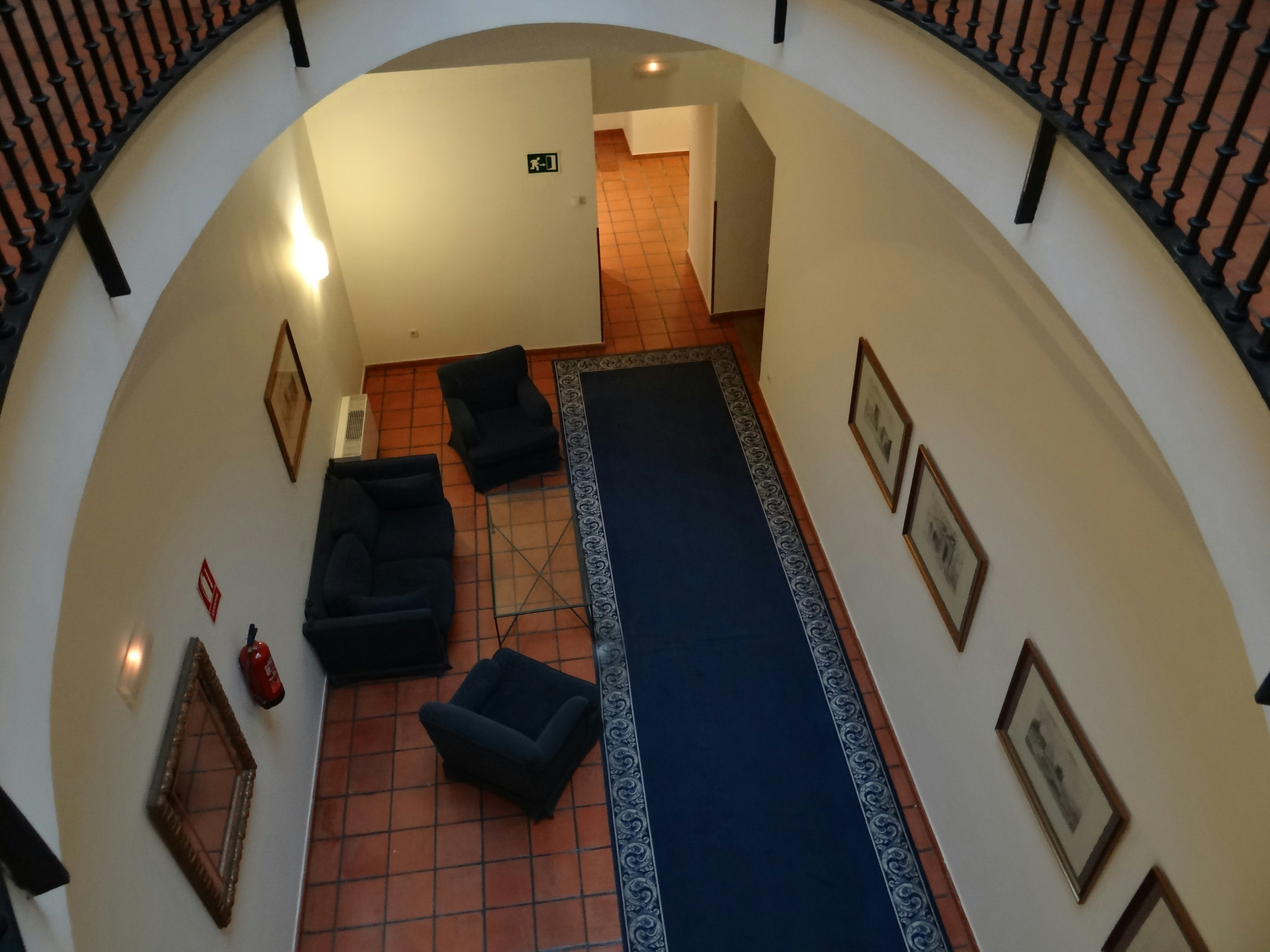 Aerial view of living room and staircase