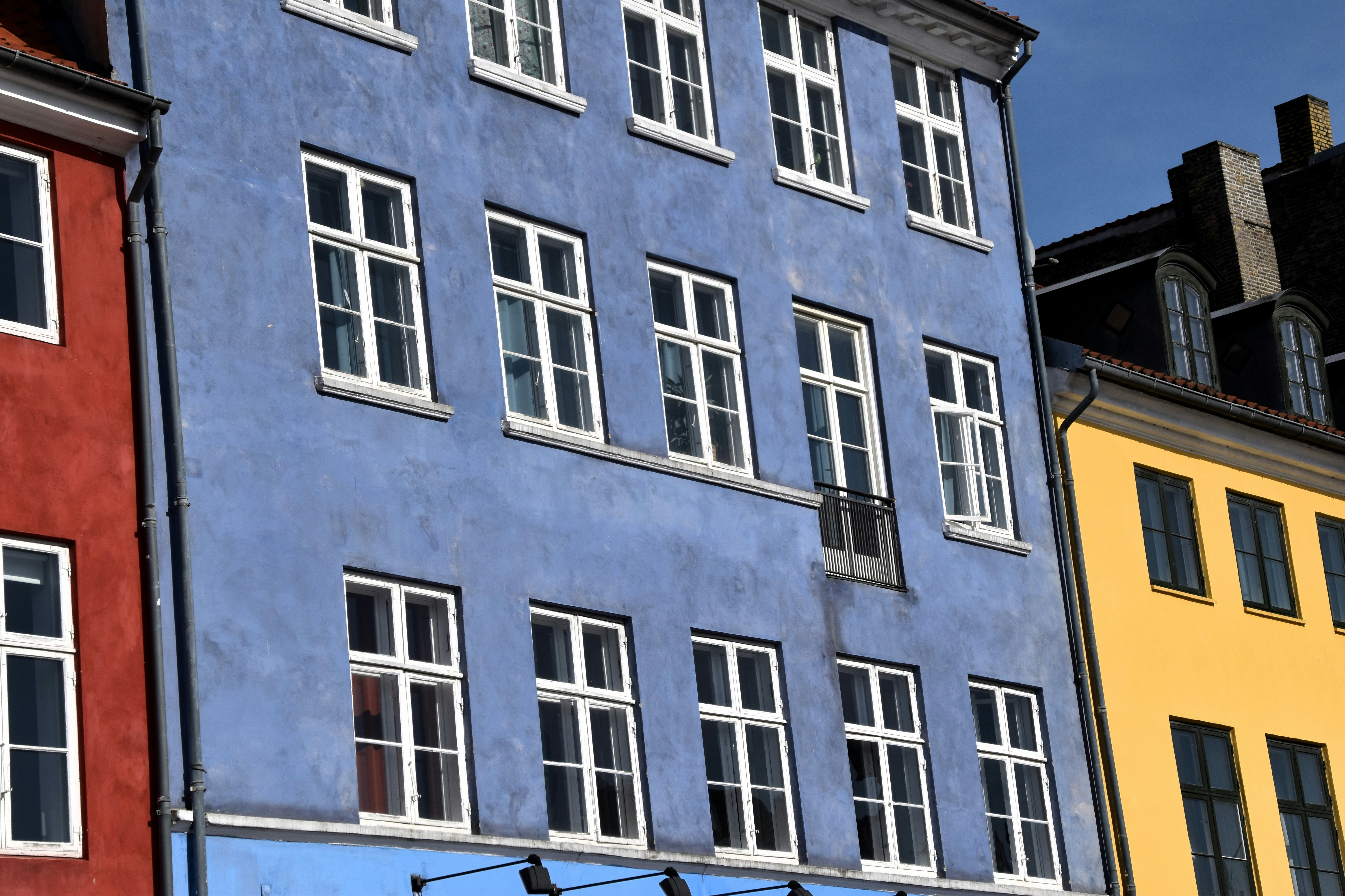 A row of colorful buildings in a city