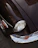 A close up of the front end of a classic car
