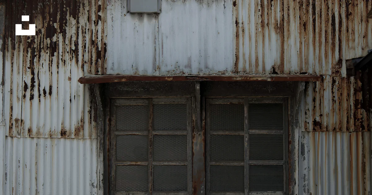 A rusted building with two windows and a stop sign photo – Free 日本、大阪府 ...