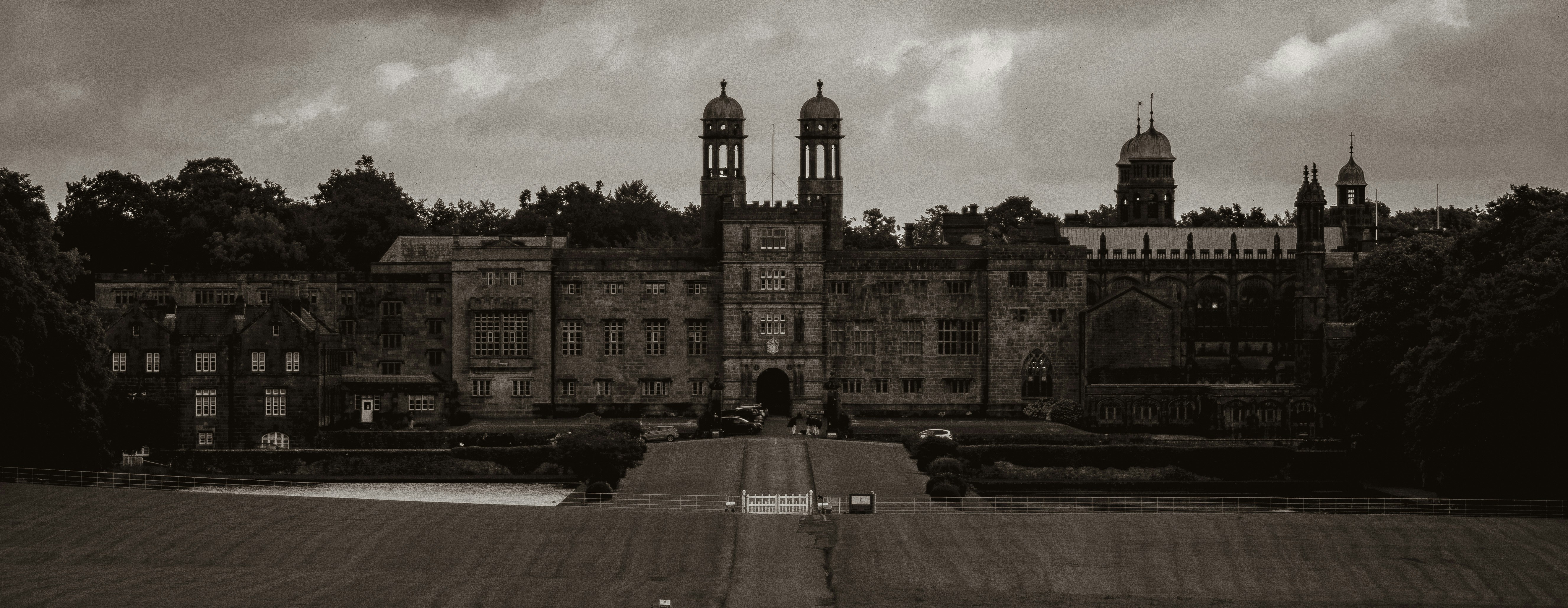 A black and white photo of a large building