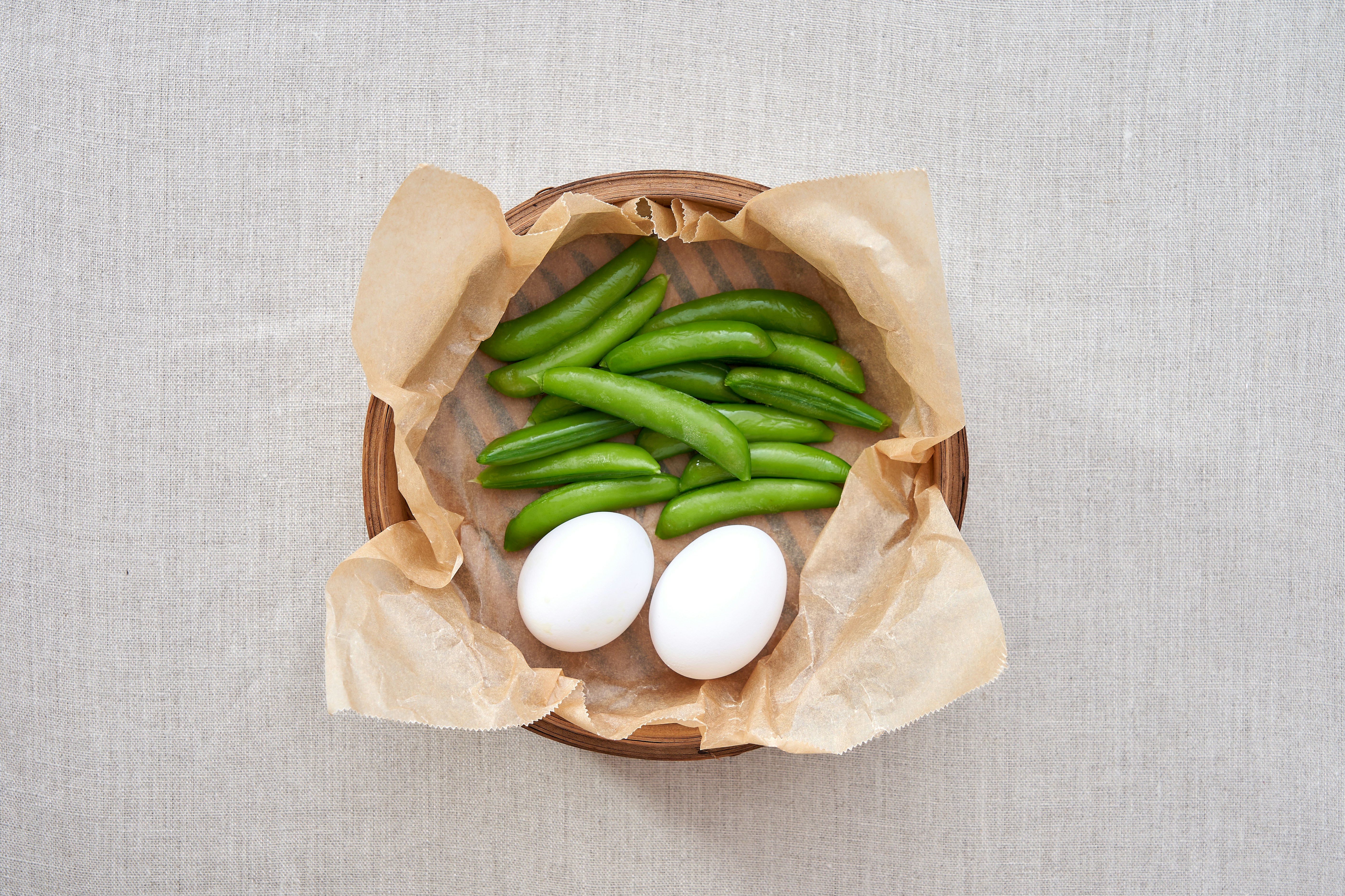 Affordable grocery haul featuring beans, rice, frozen spinach, and eggs - healthy meals for students