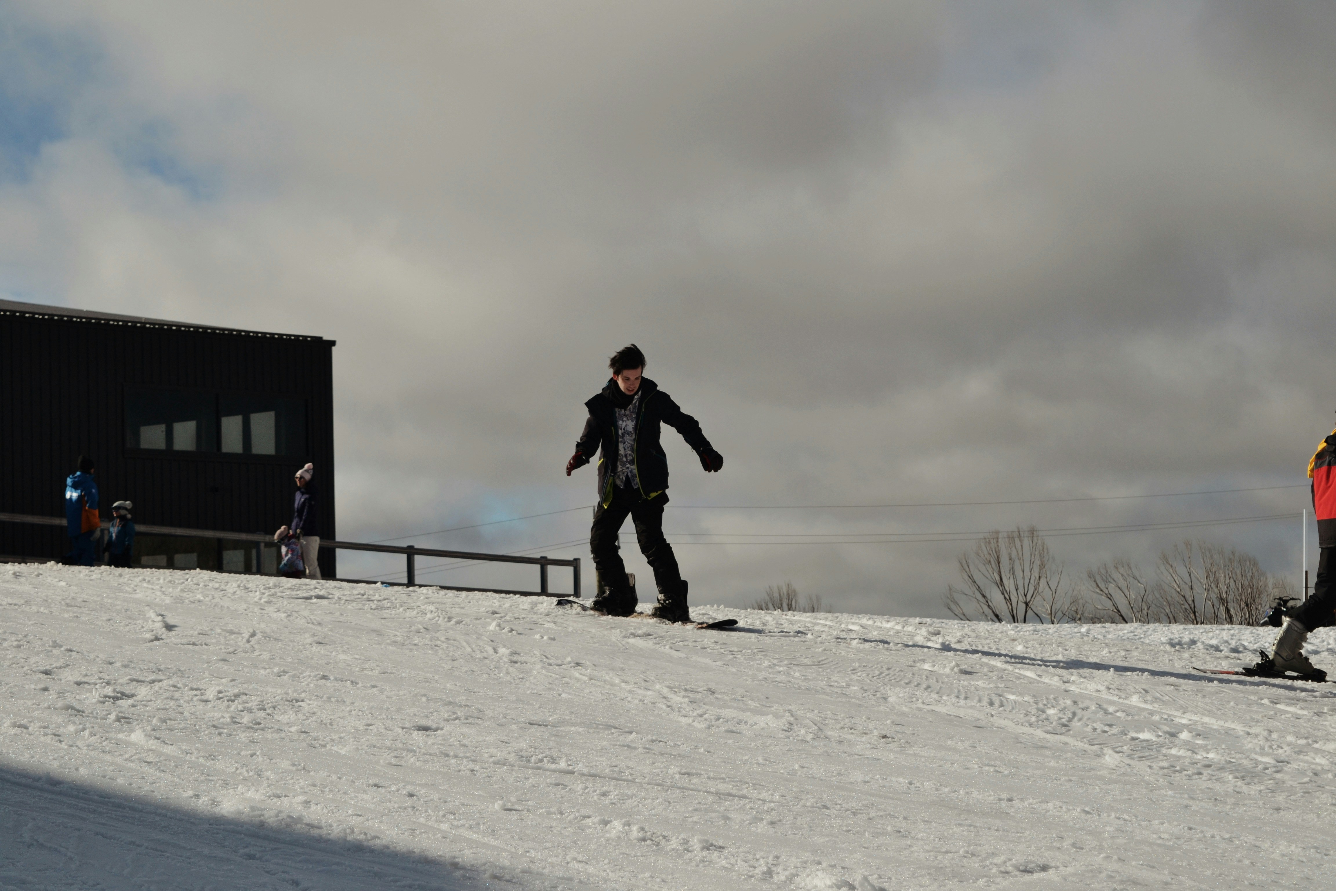 Snowboarding instructor teaching