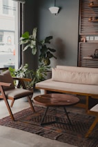 A living room filled with furniture and a large window